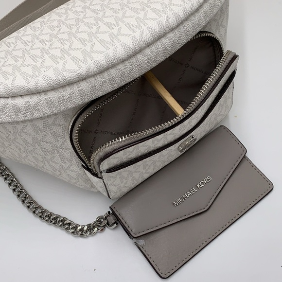 MICHAEL KORS
Maisie Large Logo 2-in-1 Sling Pack
Optic White/Silver 
NWT - Picture 5 of 16